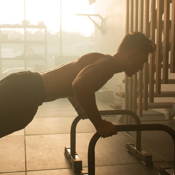 Women in a fitness class doing stretching and mobility exercises